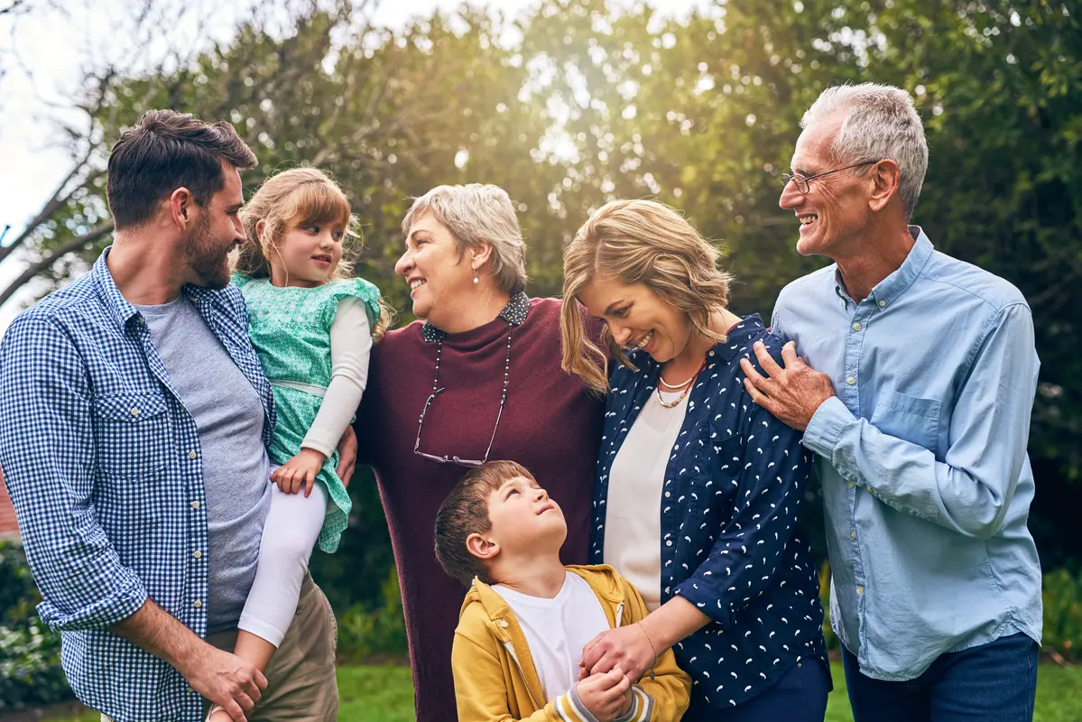 Three generations of a family spending time together outdoors
